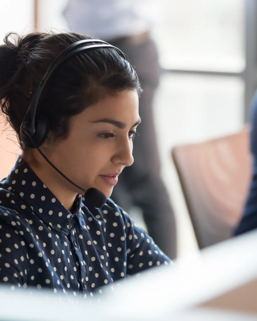 woman on phone using nimbus hub ensuring business continuity of communication for compliance and security connection.