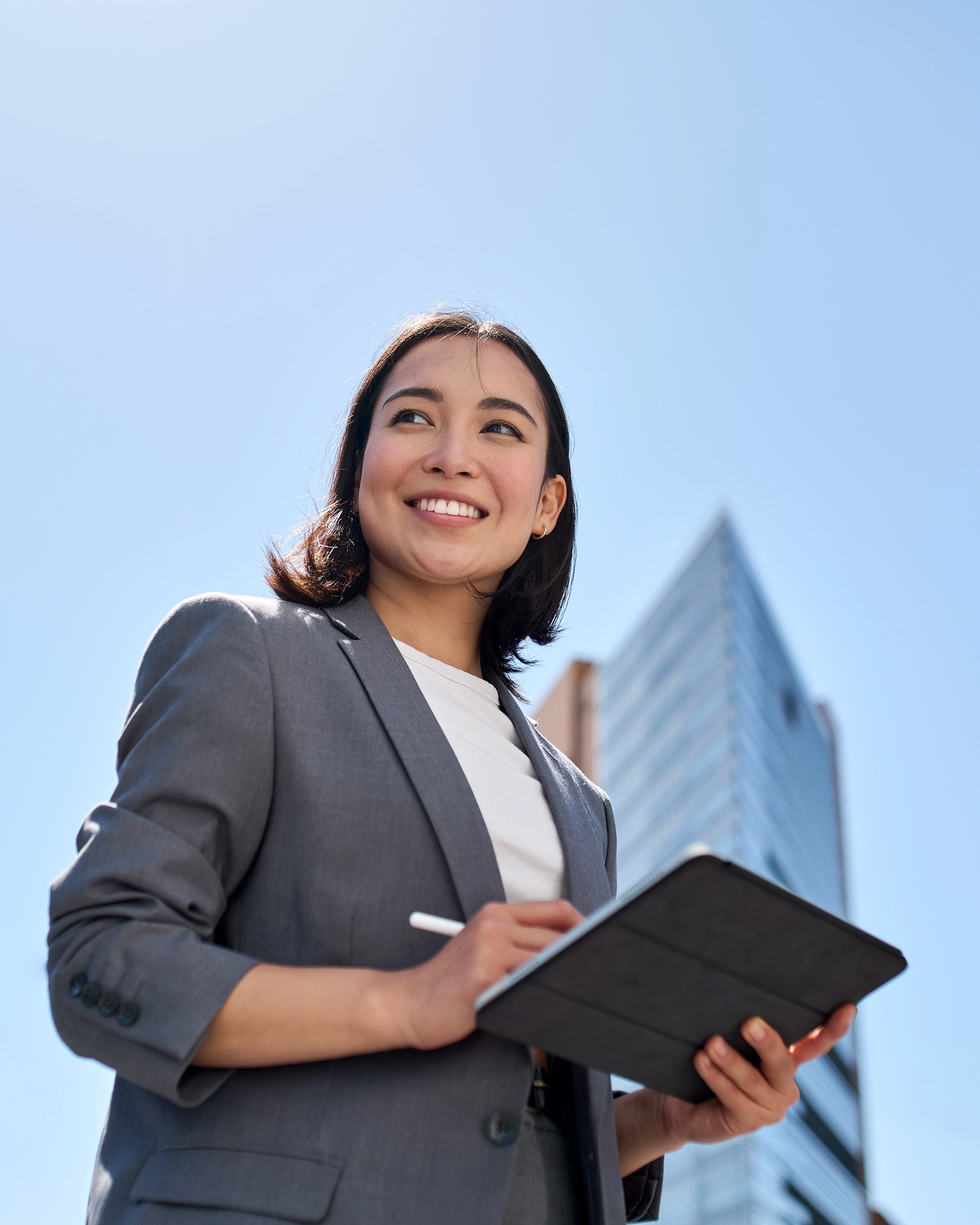 IT careers and job opportunities at nimbus - woman holding tablet