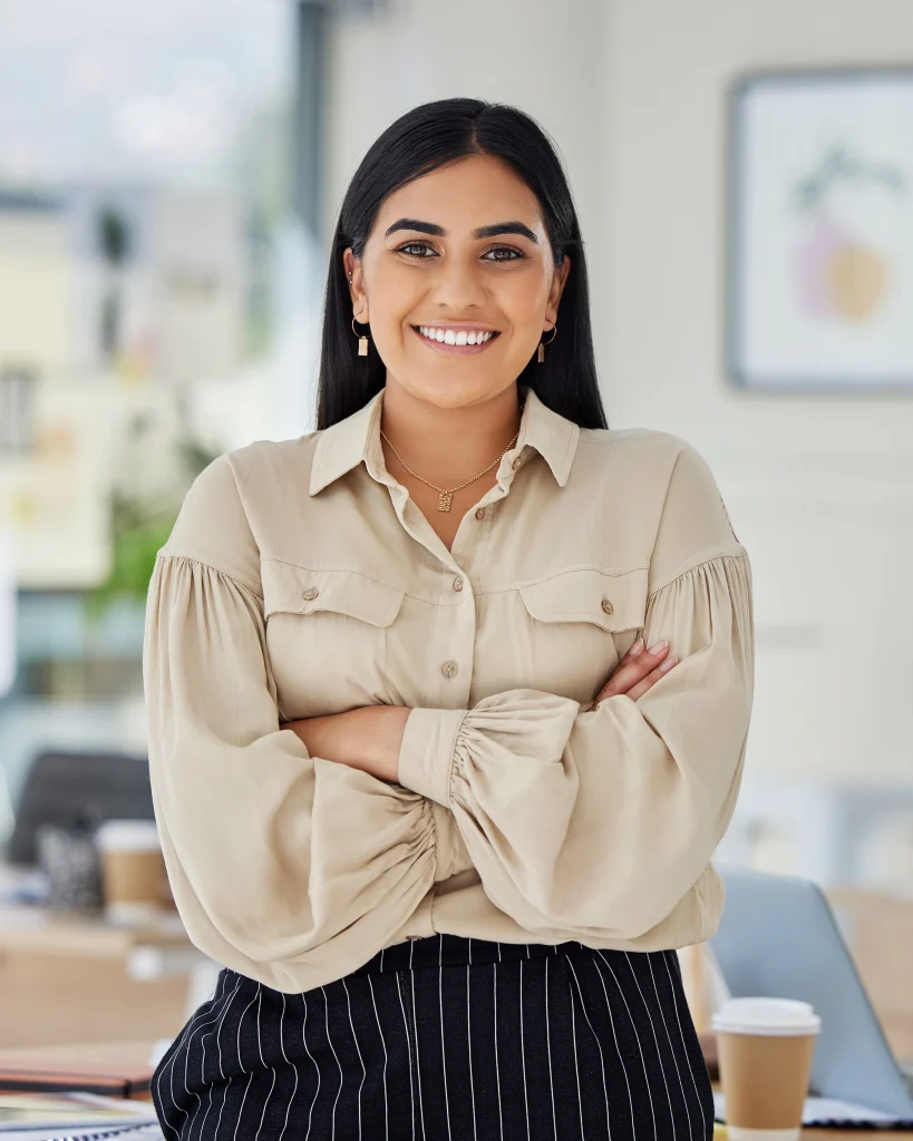 nimbus compliance management system - woman in office smiling